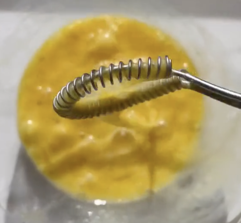 whisk over a bowl of cracked eggs